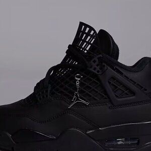 Nike Air Jordan 4 Net sneakers in black and silver